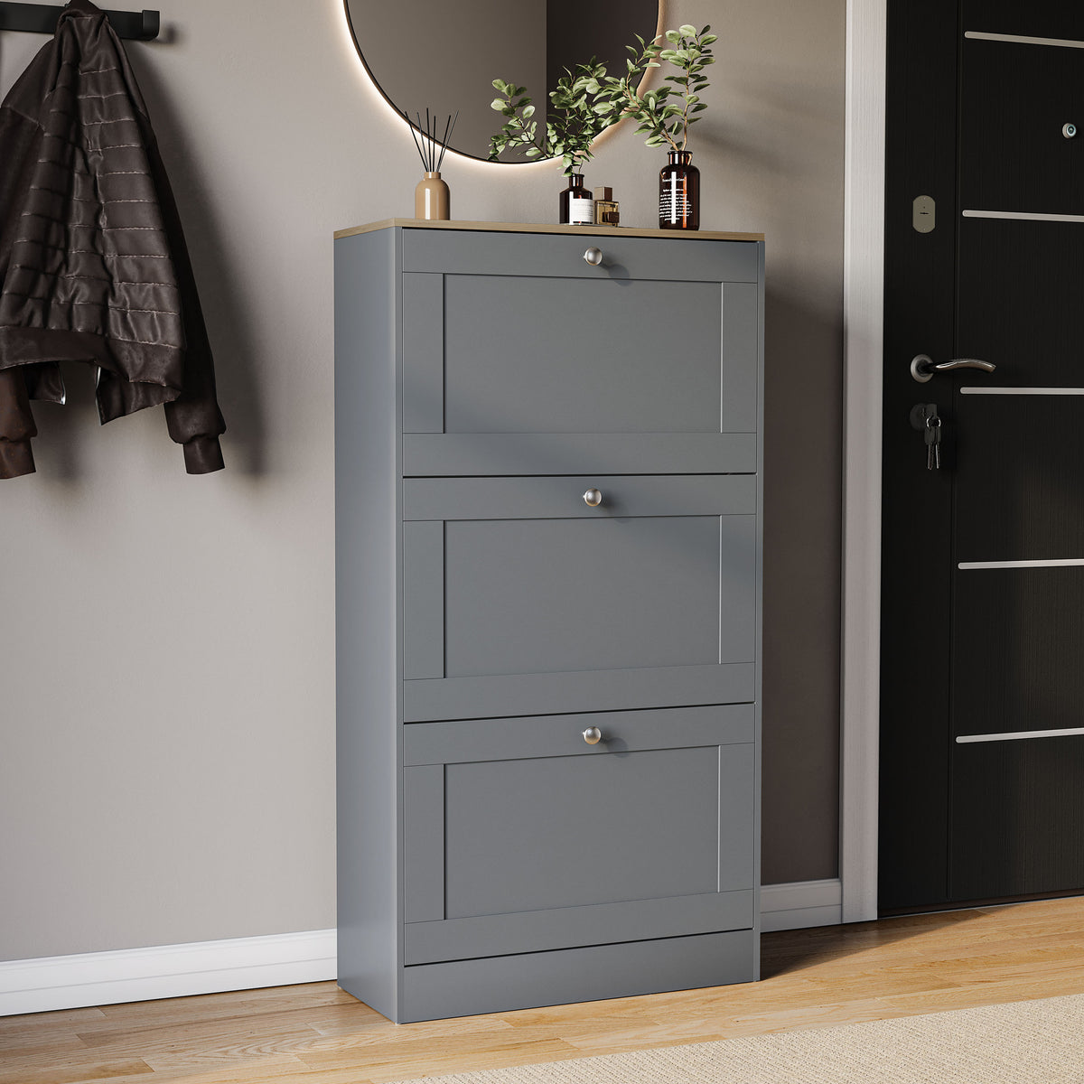 Three-drawer shoe cabinet in grey & oak, with three pull-out drawers.
