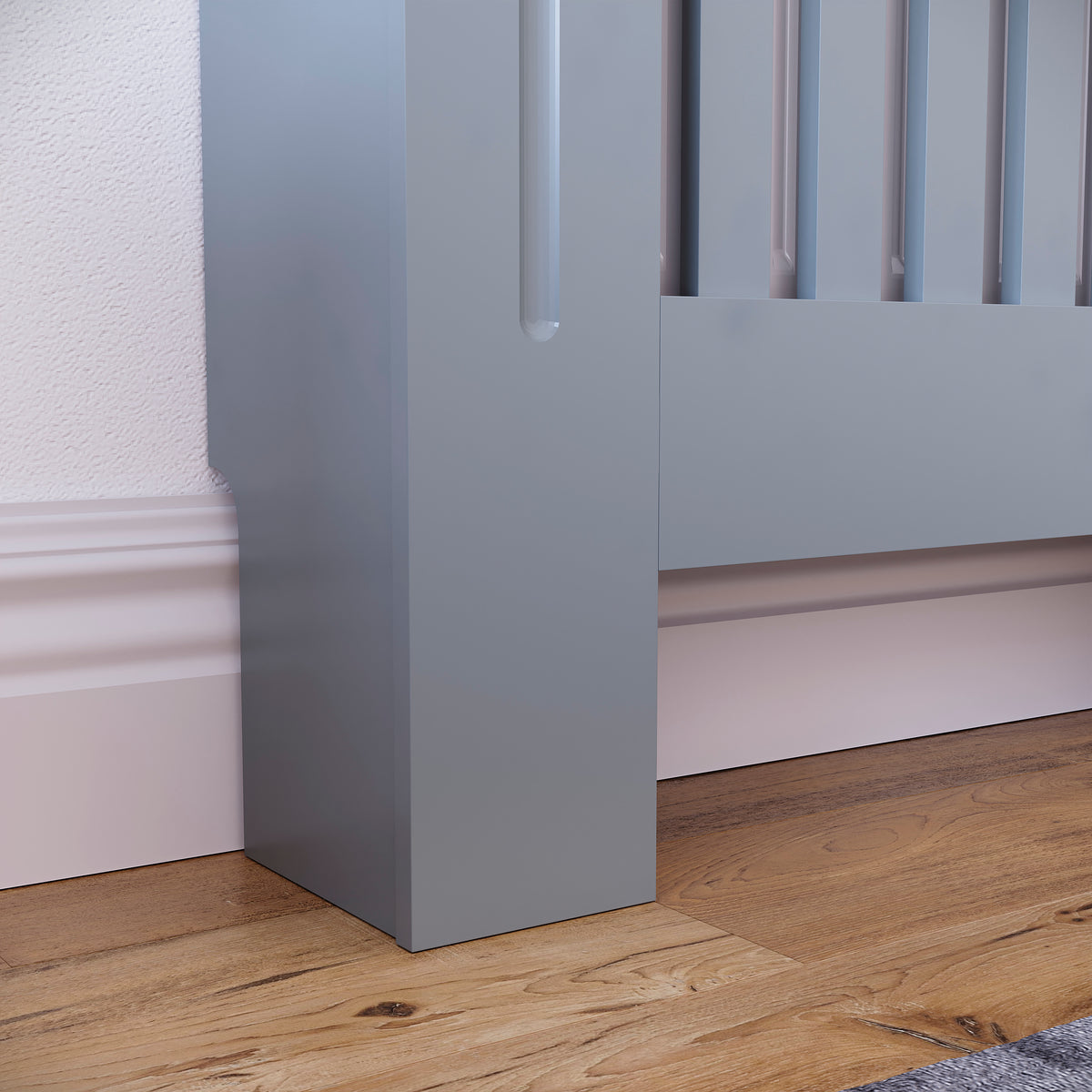 Small Grey Chelsea radiator cover with decorative slatted front.
