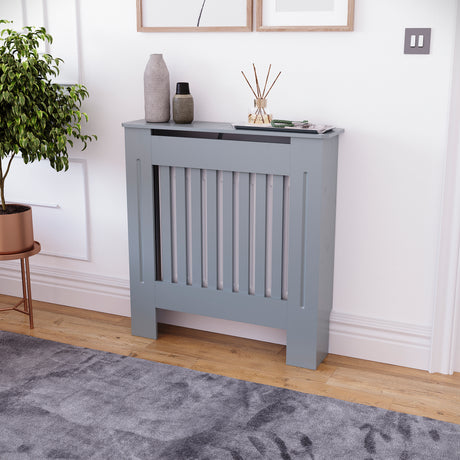 Small Grey Chelsea radiator cover with decorative slatted front.
