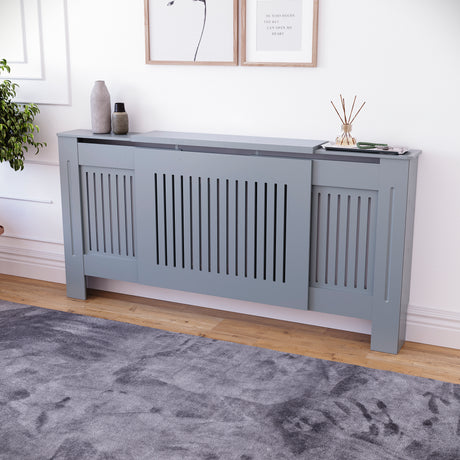 Adjustable Grey Chelsea radiator cover with decorative slatted front.
