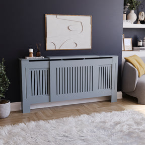 Adjustable Grey Chelsea radiator cover with decorative slatted front.
