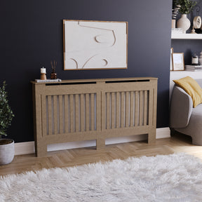 Large unfinished Chelsea radiator cover with decorative slatted front, ready to paint
